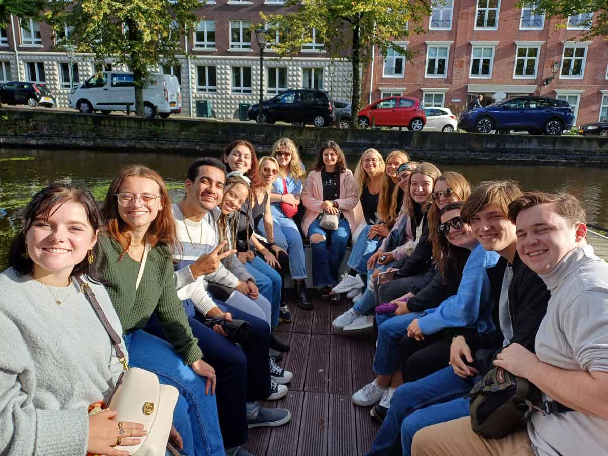 students gathered together in a park