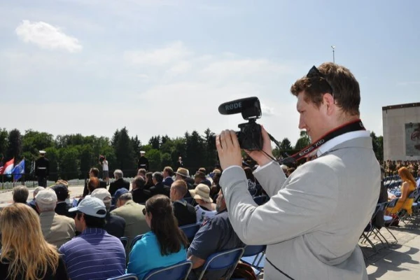 student working with camera at an event in Luxembourg
