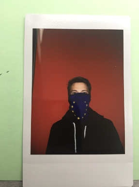 Polaroid picture of a masked student