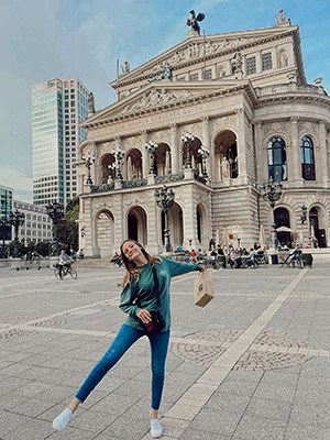 Rachel strikes a pose outside a Cathedral