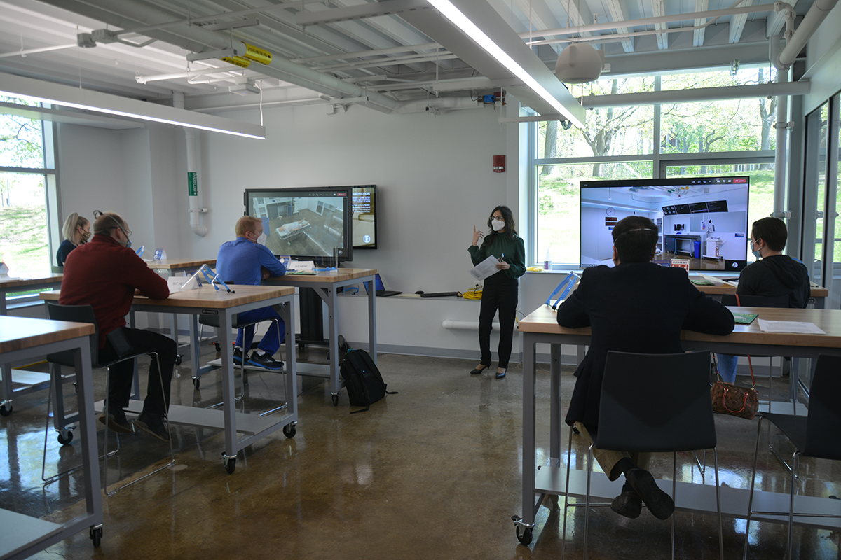 Team performing simulations in the design lab