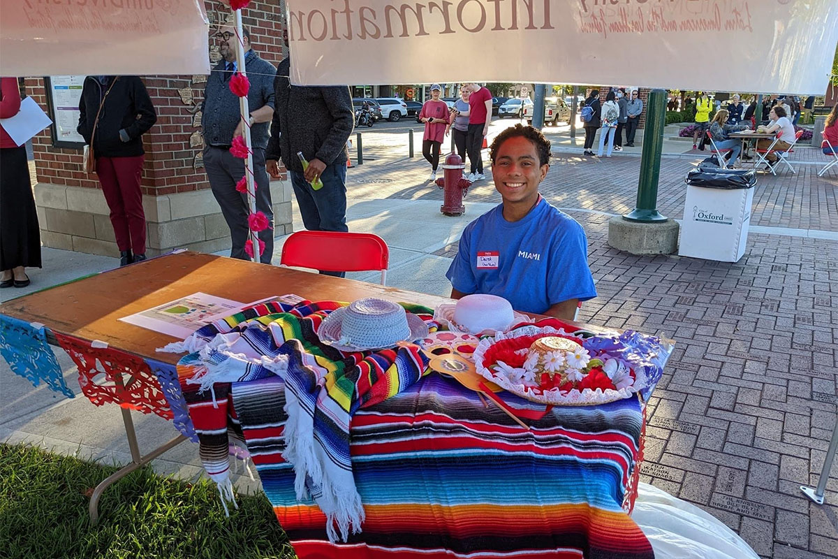 Colorful display and smiling man