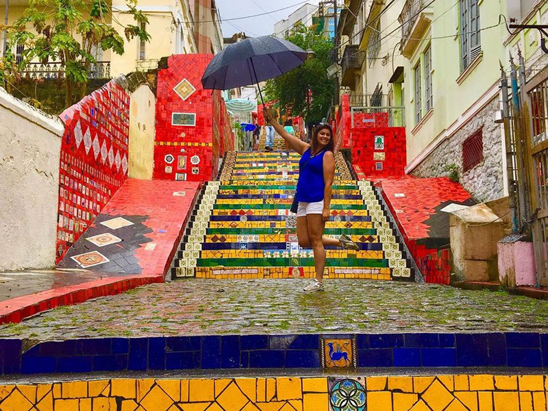 Miller poses on colorful steps in Rio