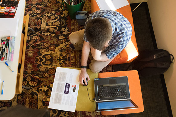 Student working on their laptop
