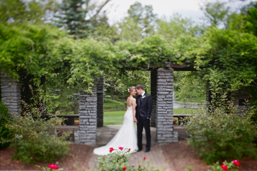 A bride and groom in the Conrad Formal Gardens.