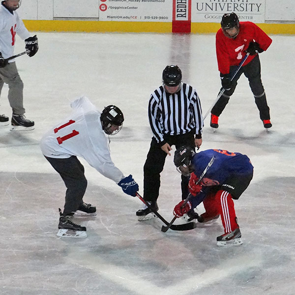 Face off during a intramural hockey game