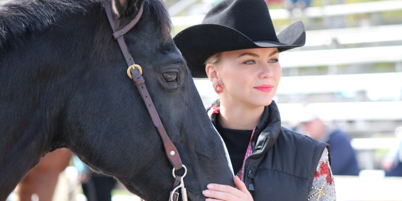 Member of Equestrian Team with one of the horses