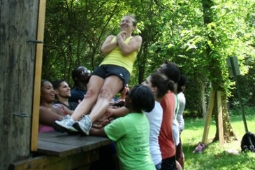 Group participating in a trust fall.