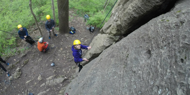 Group rock climbing in the great outdoors