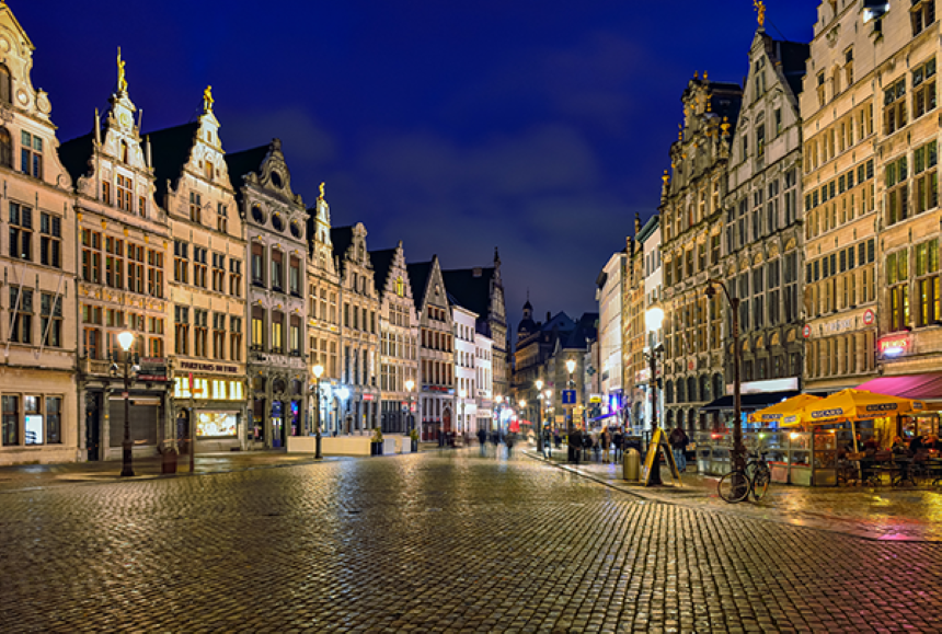 Photograph of a European city at night.