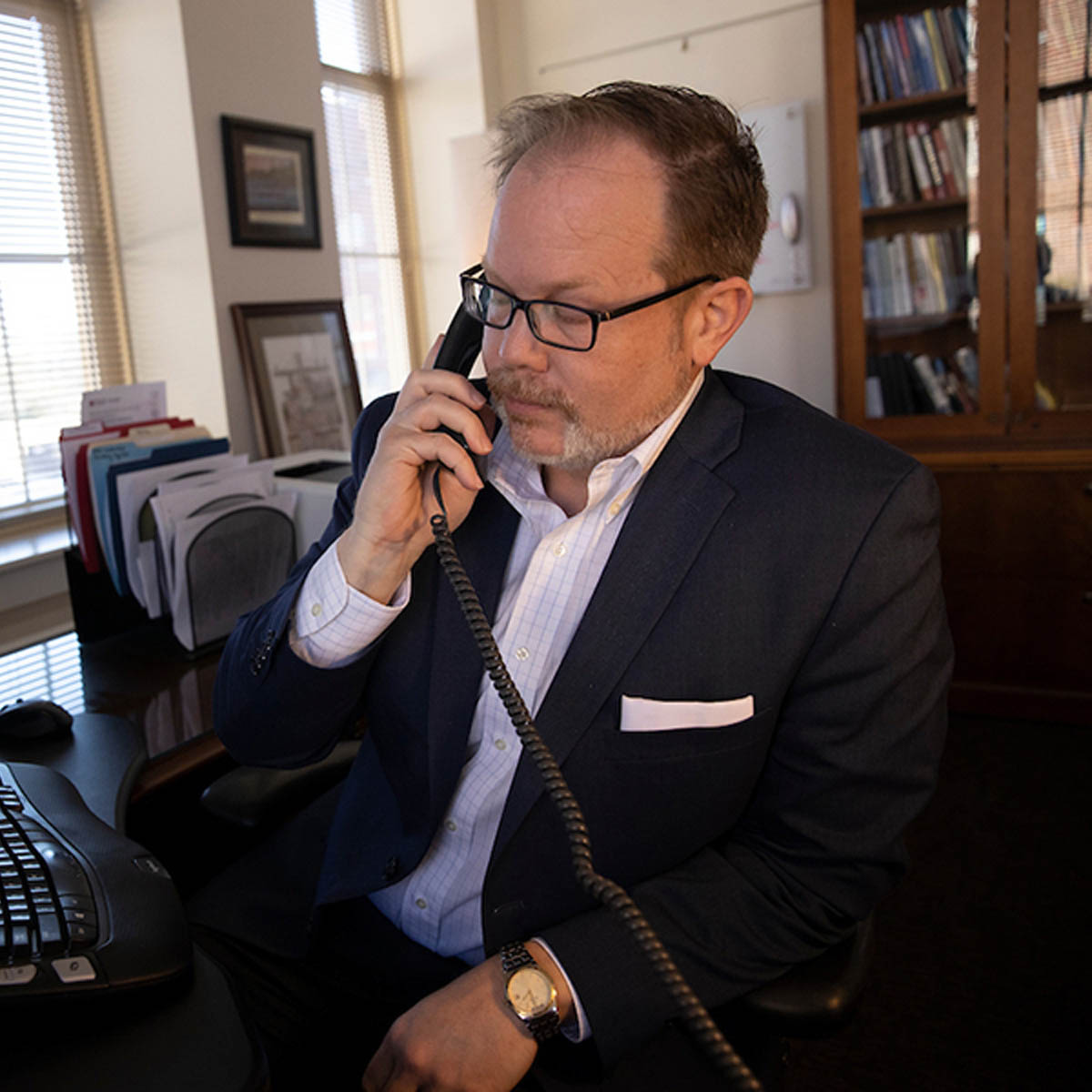 person on the phone in office