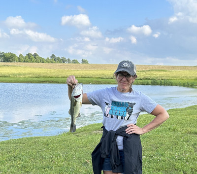 Lori Minges holding a fish