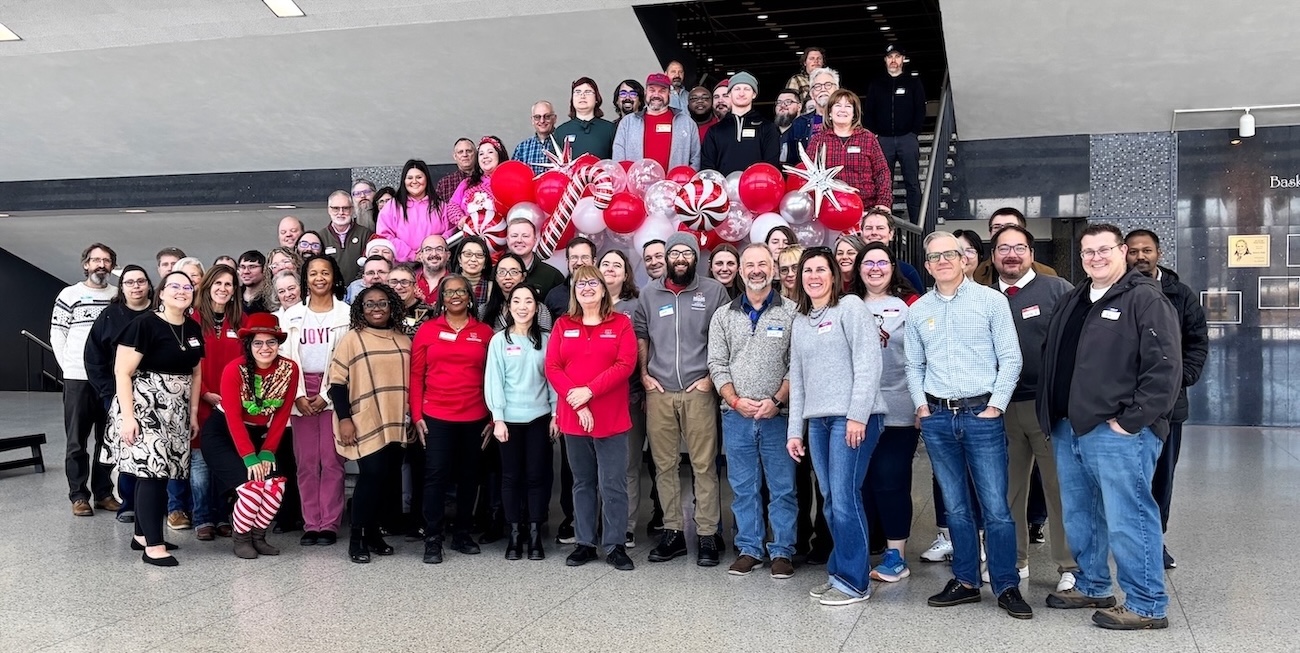 IT Services staff at Miami University gathered for a group photo at their 2025 Holiday party in Millett Hall