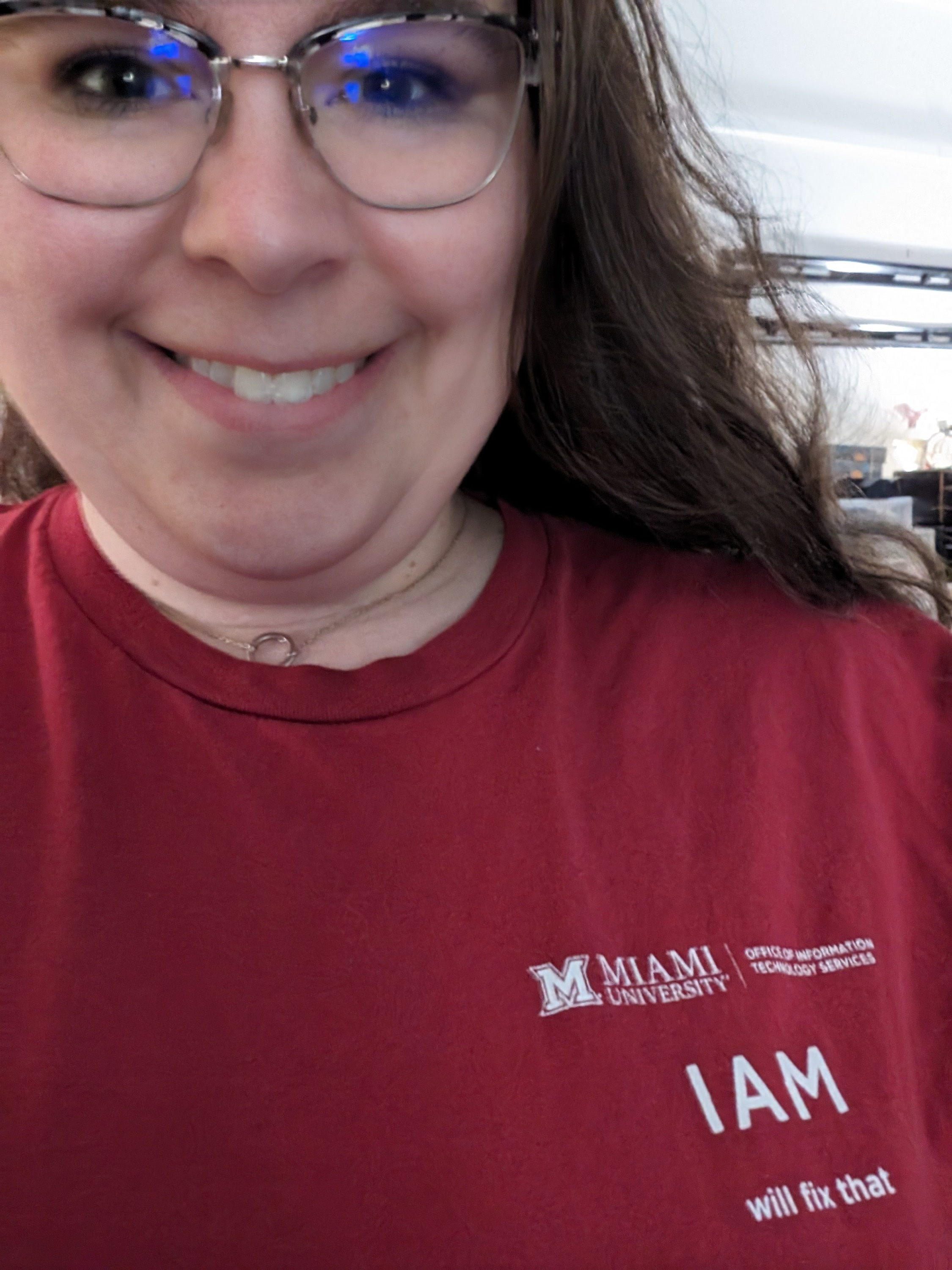 Erin Mills wearing a shirt that says IAM Will Fix That