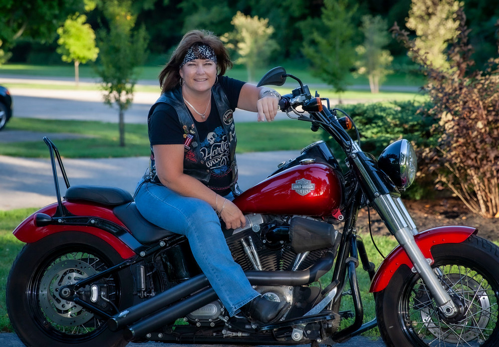 Amy on a motorcycle
