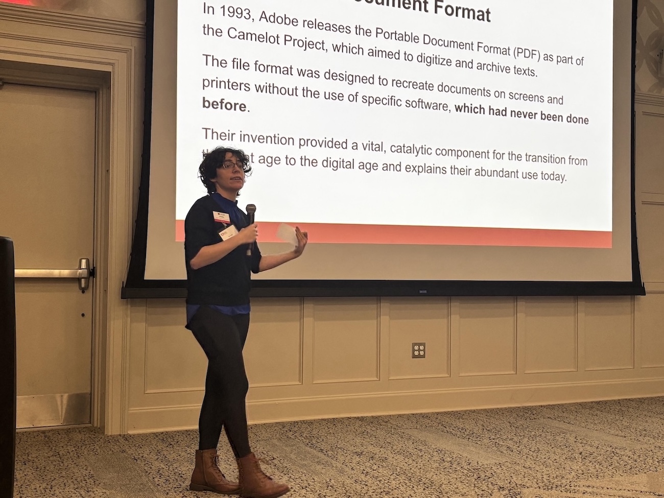 Kit Kirby gives a presentation about accessibility at the 2025 access for all symposium