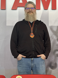 Patrick Hawk proudly sporting the winning medal