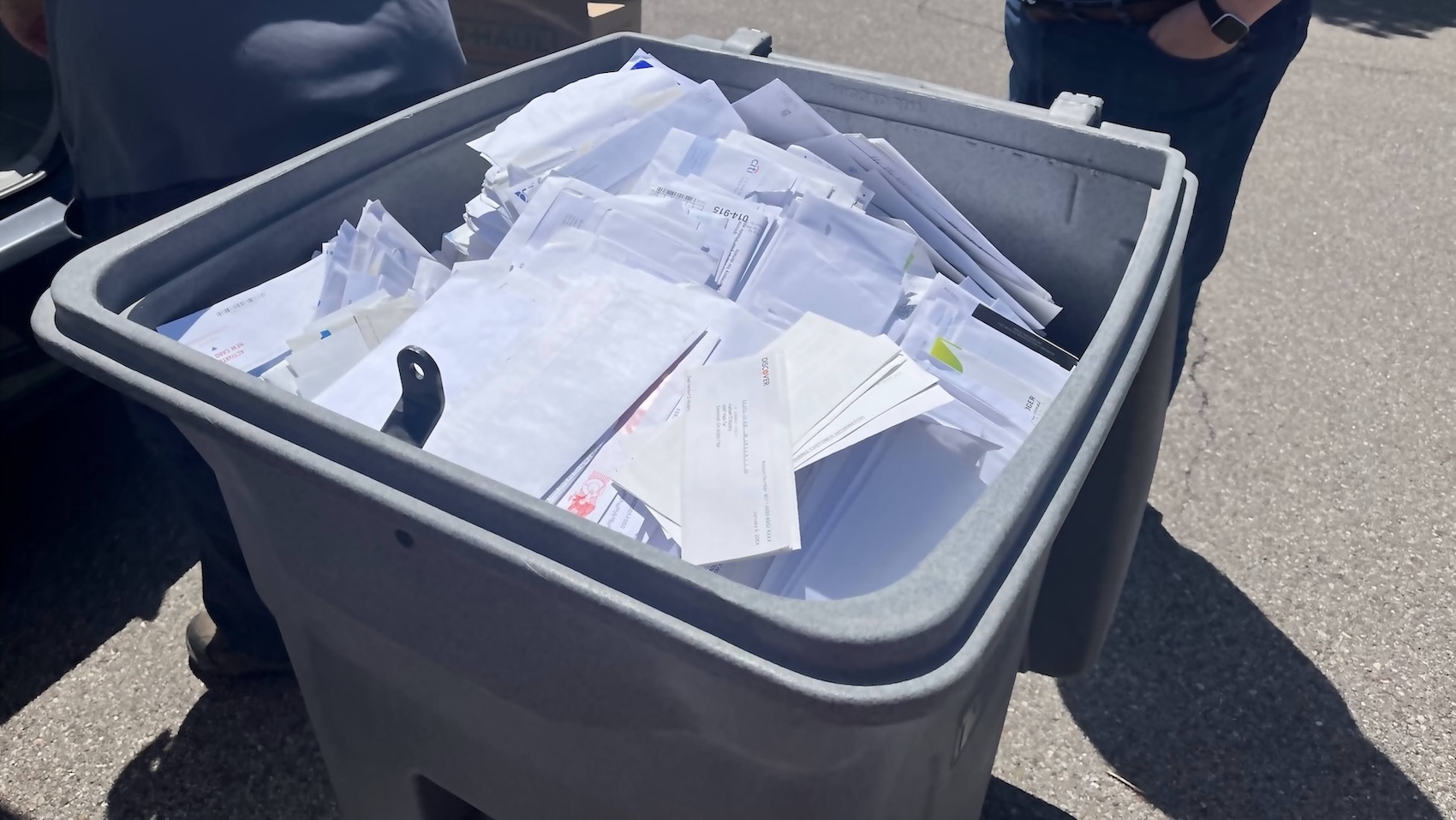 A bin full of paper ready to be shredded