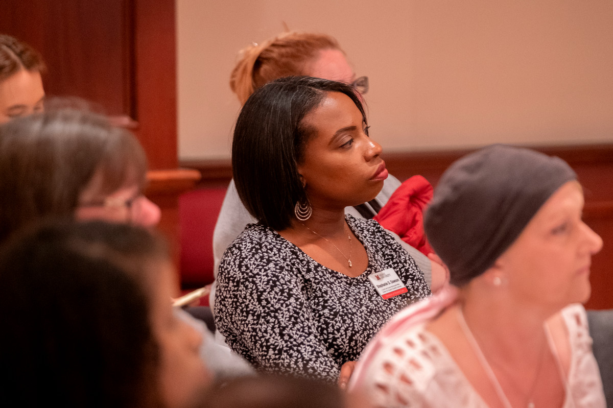Women listening to the Keynote Address.