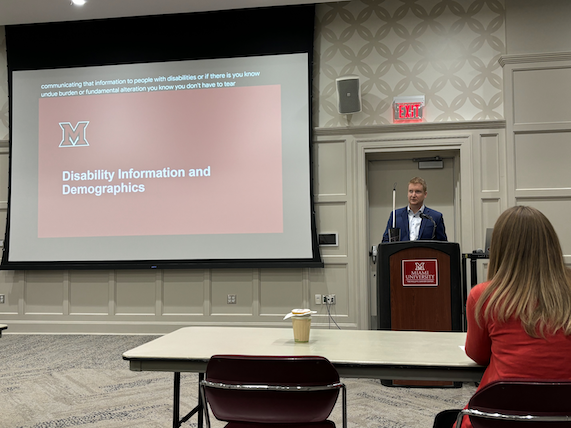 Corbb O'Connor presents during breakout session on disability information and demographics