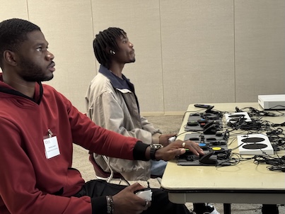 Student interns play a game