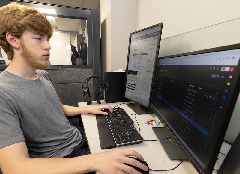 Student intern running tests on websites