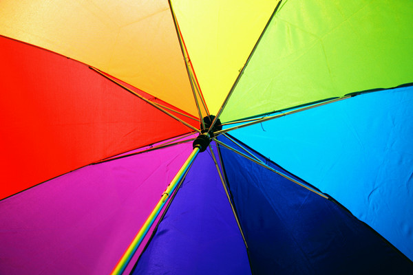 Colors of an open umbrella forming a color wheel