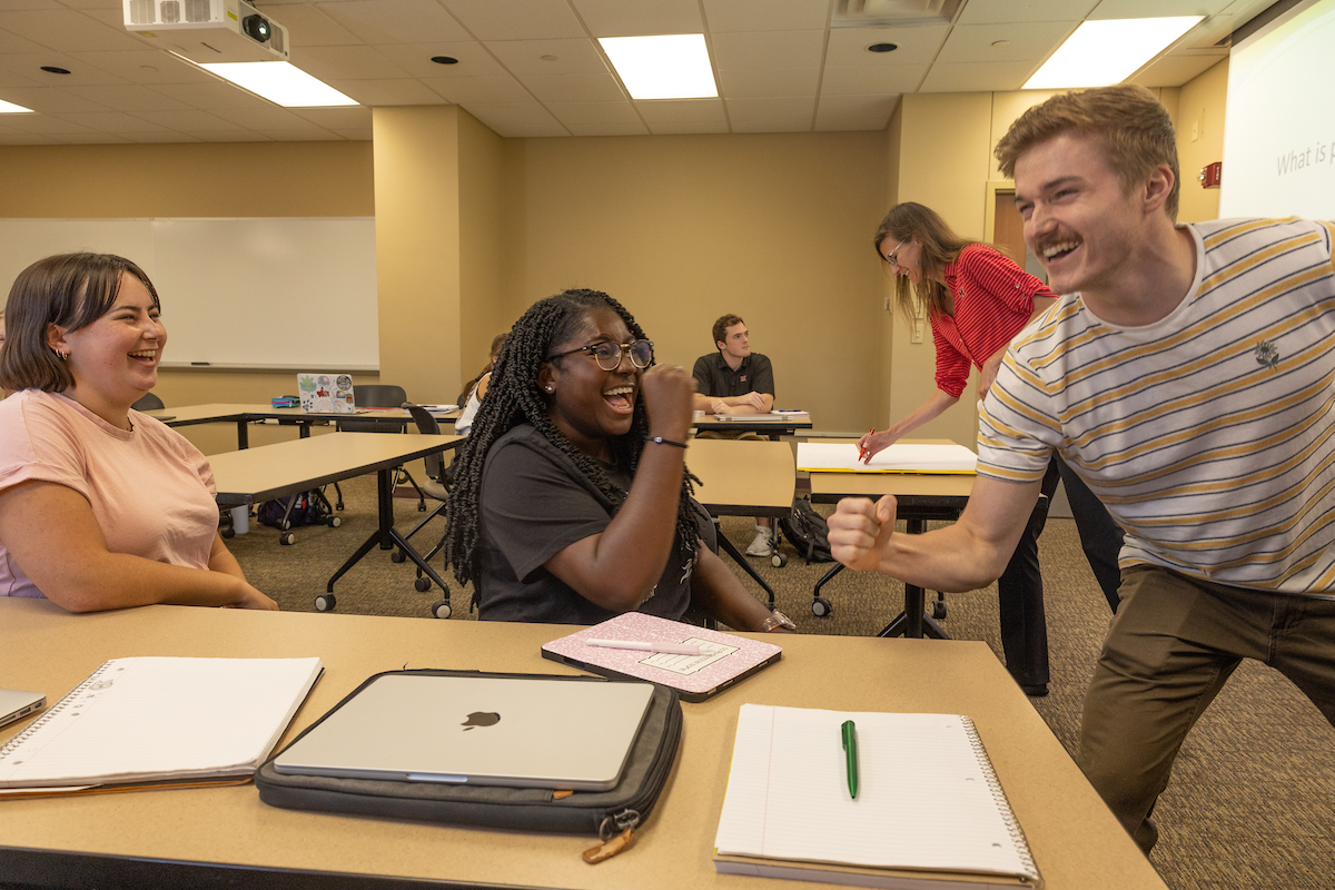 Students involved in a politics discussion.