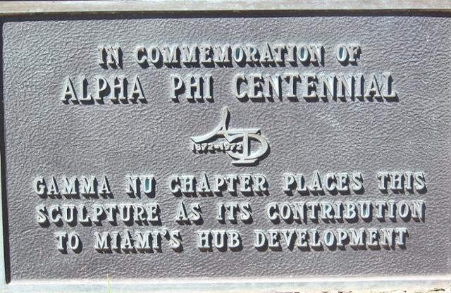 Plaque that reads In Commemoration of Alpha Phi Centennial, 1872-1972, Gamma Nu Chapter places this sculpture as its contribution to Miami's Hub Development.