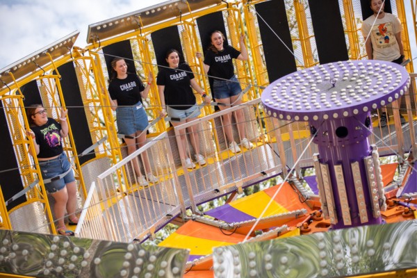 Students riding a carnival ride
