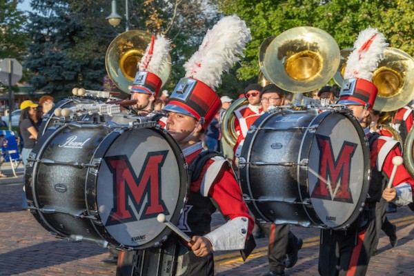 Homecoming parade of students playing in the marching band