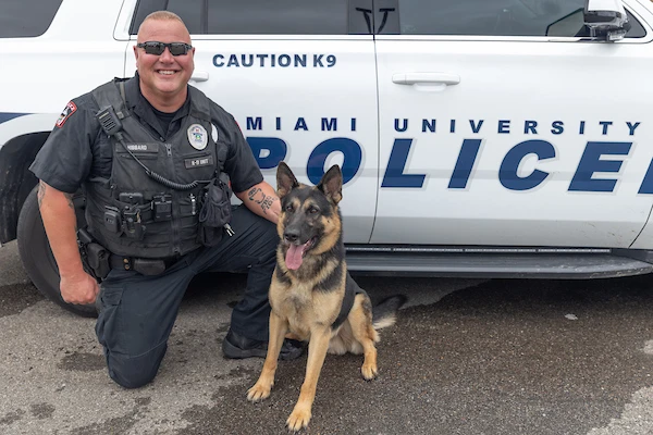 k9 leo with office keith hubbard