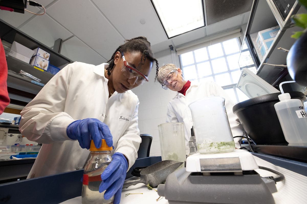 Jules Jefferson working with her professor in a lab on a biochemistry project