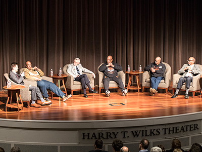 Student moderator (left) with the players, coach, and Wil Haygood