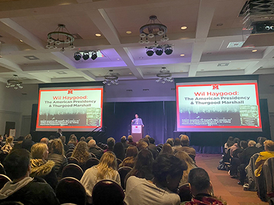 Wil Haygood addresses the packed audience.