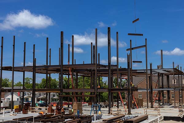 Steel beams being moved in to place in the new data science building