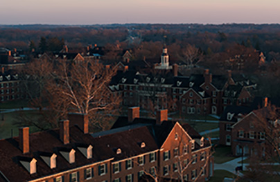 Drone view of central quad and MacMillan Hall in the sunset