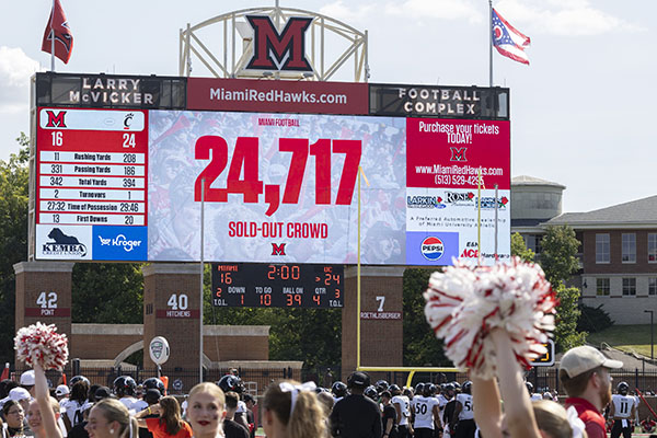 A scoreboard at Yager Stadium shows the sold out attendance of 24,717 for the Miami-Cincinnati Battle for the Victory Bell game on Sept. 14.