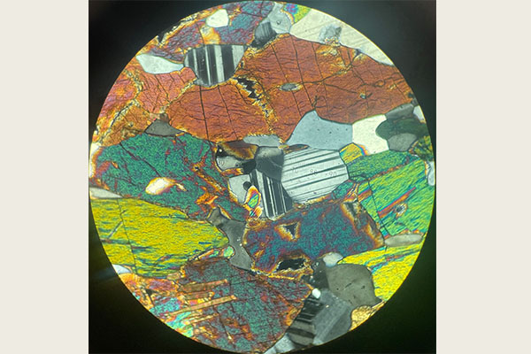 Jack Gugino’s first-place photo was shot using a polarizing light microscope in the Department of Geology and Environmental Earth Science’s petrology and geochemistry research lab.