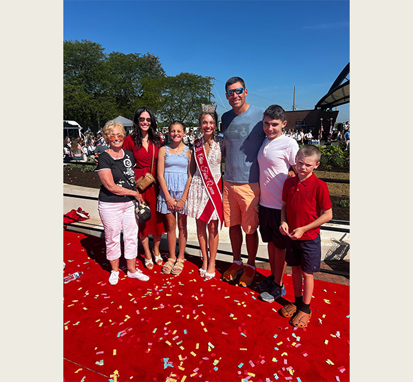 Amberly Szczerbiak stands with her family minutes after the 2025 Ohio State Fair ribbon cutting ceremony. Pictured from left to right, grandmother Joan Ward, mother Shannon Szczerbiak, sister Savanna Szczerbiak, dad Wally Szczerbiak, and brothers Maximus and Xavier Szczerbiak (photo courtesy of Amberly Szczerbiak).