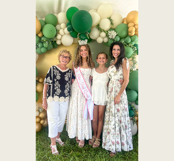 Amberly Szczerbiak stands with her grandmother Joan Ward, sister Savanna Szczerbiak, and mom Shannon Szczerbiak during opening day of the Fayette County Fair (photo courtesy of Amberly Szczerbiak).