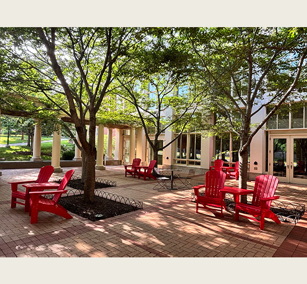 The Armstrong Student Center's patios feature 90 new, red Adirondack chairs.