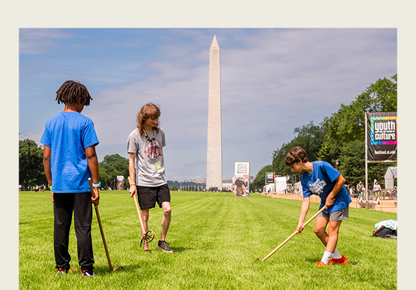 teaching myaamia lacrosse to youth on the National Mall