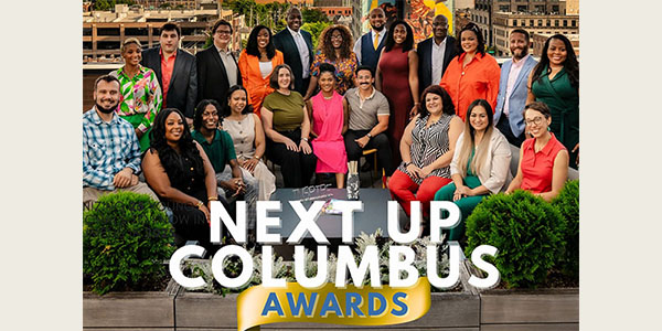 Erica Noll Crawford, seated third from right, was honored recently with a Next Up Columbus Award.