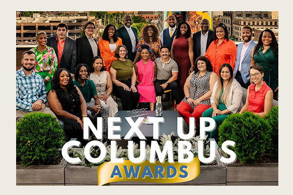 Erica Noll Crawford, seated third from right, was honored recently with a Next Up Columbus Award.