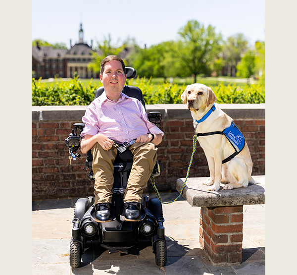 Dan Darkow with his service dog, Kismet (photo by Scott Kissell).