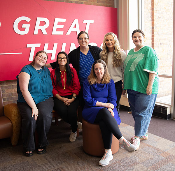 Ruth Orth, center, with Regionals marketing and Communications staff members 