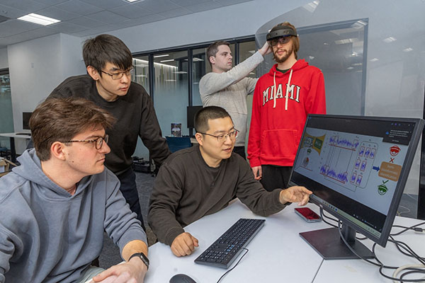 Miami university students Ian Dewey, Zhaowen Chen, Camden Amata, and Evan Patterson with professor Xianglong Feng