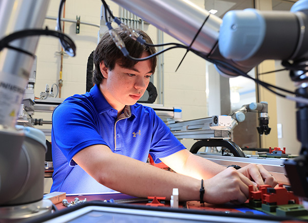 Chris Tsai works in the Smart Lab in Garland Hall