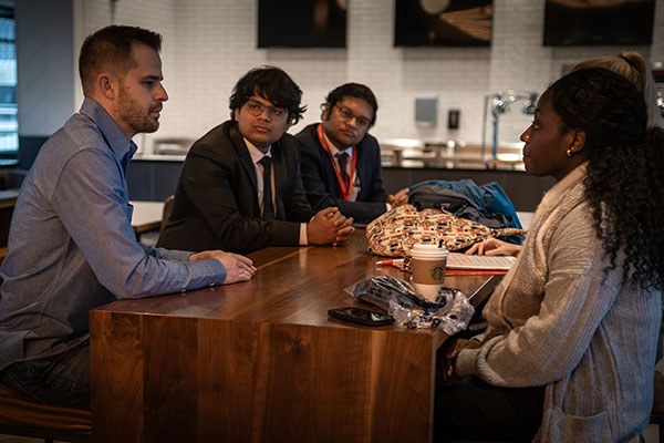 People talking around a table